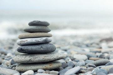 Fototapeta na wymiar Stack of stones on a seashore
