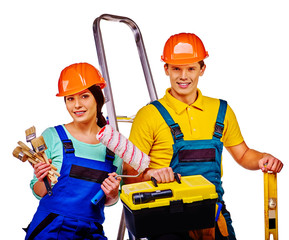 Couple builder  with construction tools.