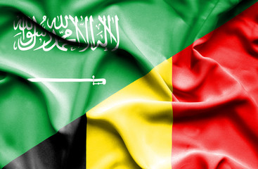 Waving flag of Belgium and Saudi Arabia