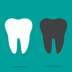 Set of two teeth on turquoise background