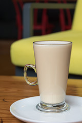 hot coffee on wood table