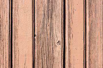 Naklejka premium Red paint wooden desks texture.