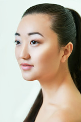 Naklejka premium Portrait of beautiful young asian woman. Natural make-up.