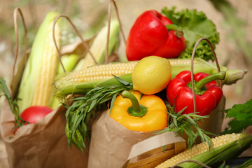 Fresh vegetables at shopping bags grocery market