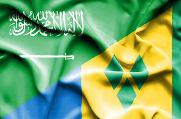 Waving flag of Saint Vincent and Grenadines and Saudi Arabia