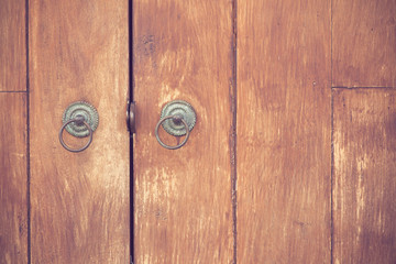 the part of wooden door with metal handle vintage color