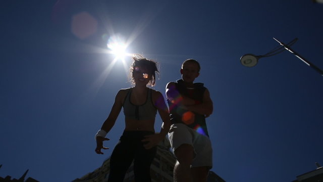 Parkour Team Jumping Of Bollards