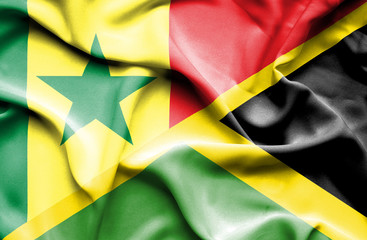 Waving flag of Jamaica and Senegal