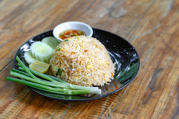Thai fried rice on wooden desk