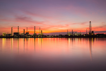 Oil refinery along the river at Dusk (Bangkok, Thailand)