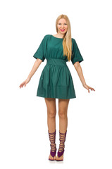 Young woman in green dress isolated on white