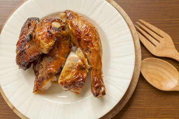 Grill chicken thai style on wood background