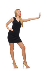 Fototapeta premium Young pretty woman in mini black dress isolated on white