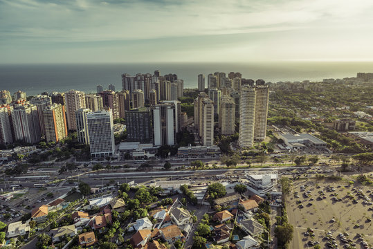 Aerial view of modern Brazilian city at sunset
