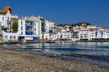 Nice view on white and blue houses in Cadaques in Spain