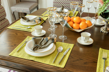 elegant table set in modern style dining room interior