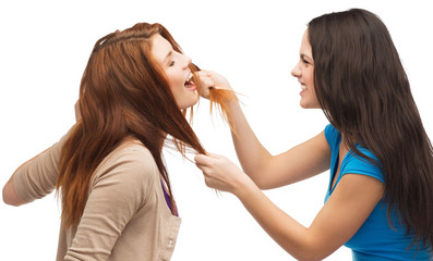 two teenagers having a fight and getting physical