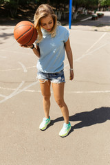 Fototapeta premium Sexy girl on the basketball court