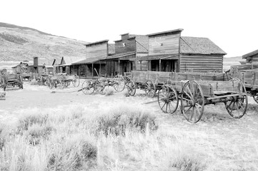 Old Wooden Wagons in a Ghost Town, Cody, Wyoming, United States, black and white version