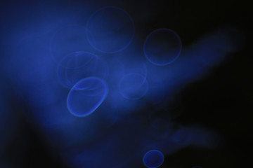 blue background water drops blur