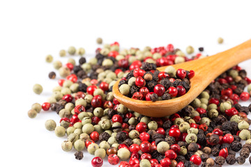 Pepper seasoning mix in wooden spoon