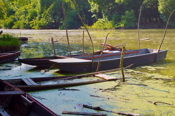 Old wooden fishing boat on the river