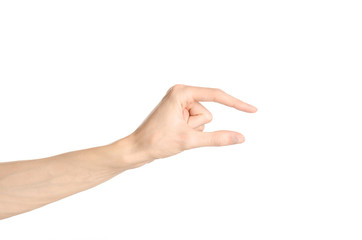 Hand gestures theme: the human hand shows gestures isolated on white background in studio