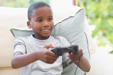 Little boy playing video games 
