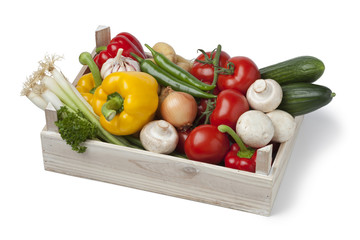 Wooden chest with fresh vegetables
