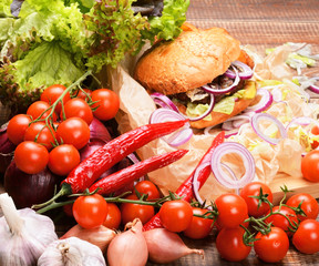 Delicious homemade burger with fresh vegetables and beef.