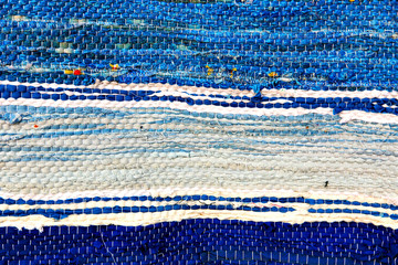 Blue handmade rug tekxure pattern.Background.