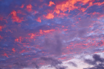Colorful evening sky with purple, pink clouds