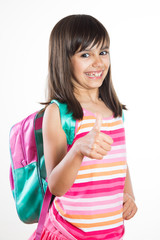 Funny school girl showing thumbs up