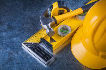 Instruments of measurement claw hammer and building helmet on sc