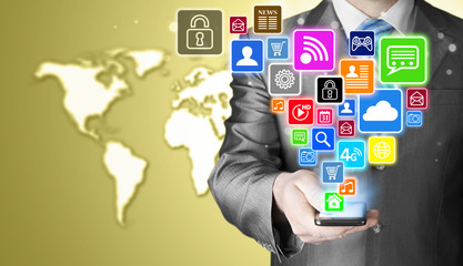 Business man using smart phone with social media icon set