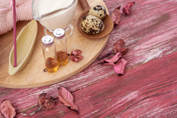 Composition of spa treatment on wooden background