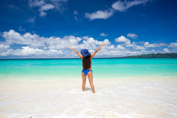 Happy woman on the beach