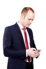 businessman in a business suit with red tie reads the message 
