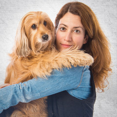 Girl hugging her dog