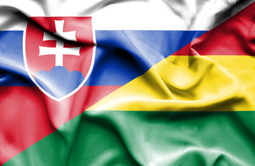 Fototapeta premium Waving flag of Bolivia and Slovak