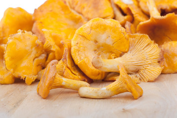 Chanterelles on wooden table