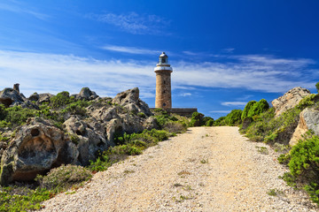 Fototapeta na wymiar road to lighthouse - San Pietro Isle, Sardinia, Italy 