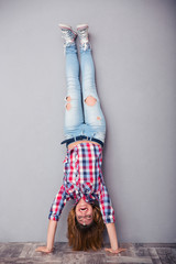 Woman standing upside down