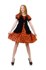 Red hair girl in orange dress isolated on white