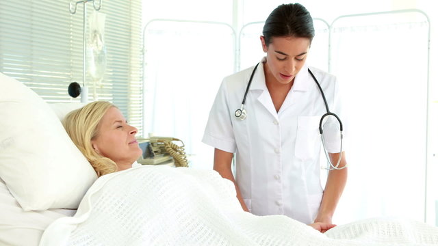 Doctor speaking with her patient