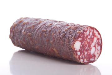 Cutted smoked sausage on white
