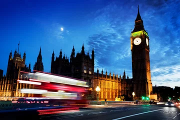 Fotobehang Red bus, Big Ben and Westminster Palace in London, the UK. at night. Moon shining © Photocreo Bednarek