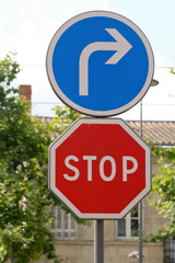Stop and turn right road signs