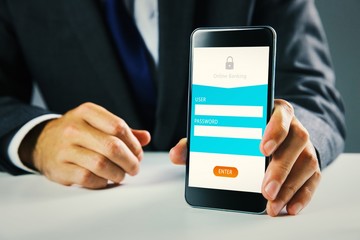 Composite image of businessman using smartphone