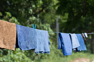 Clothes drying on a rope for sun.
